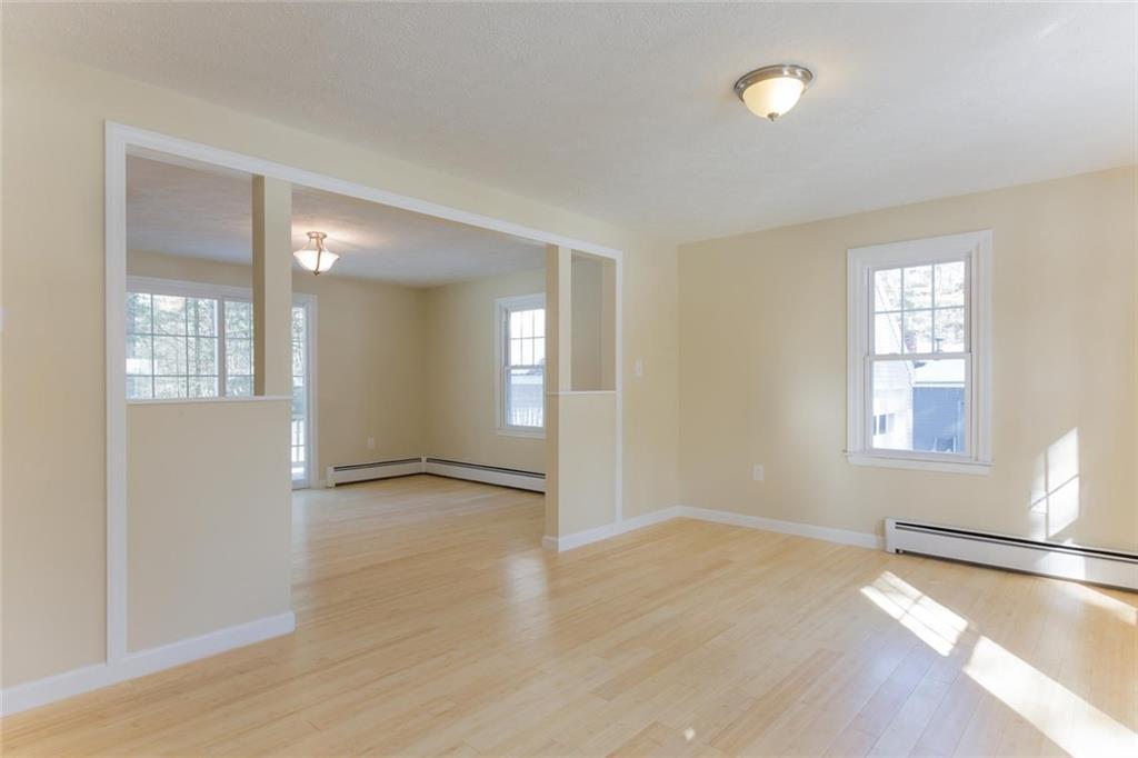 4 Banks Brook Road Old Orchard Beach, ME 04064 - Photo 4 of 35 Living room open to dining room, new...