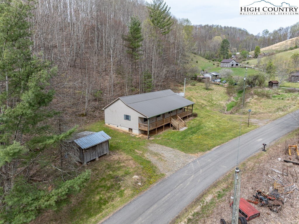 621 Trivette Hollow Road Creston, NC 28615 - Photo 4 of 43 a view of a backyard with a sink