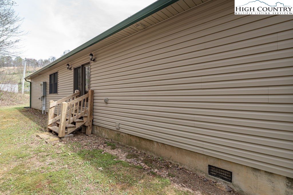 621 Trivette Hollow Road Creston, NC 28615 - Photo 41 of 43 a view of a back yard of the house