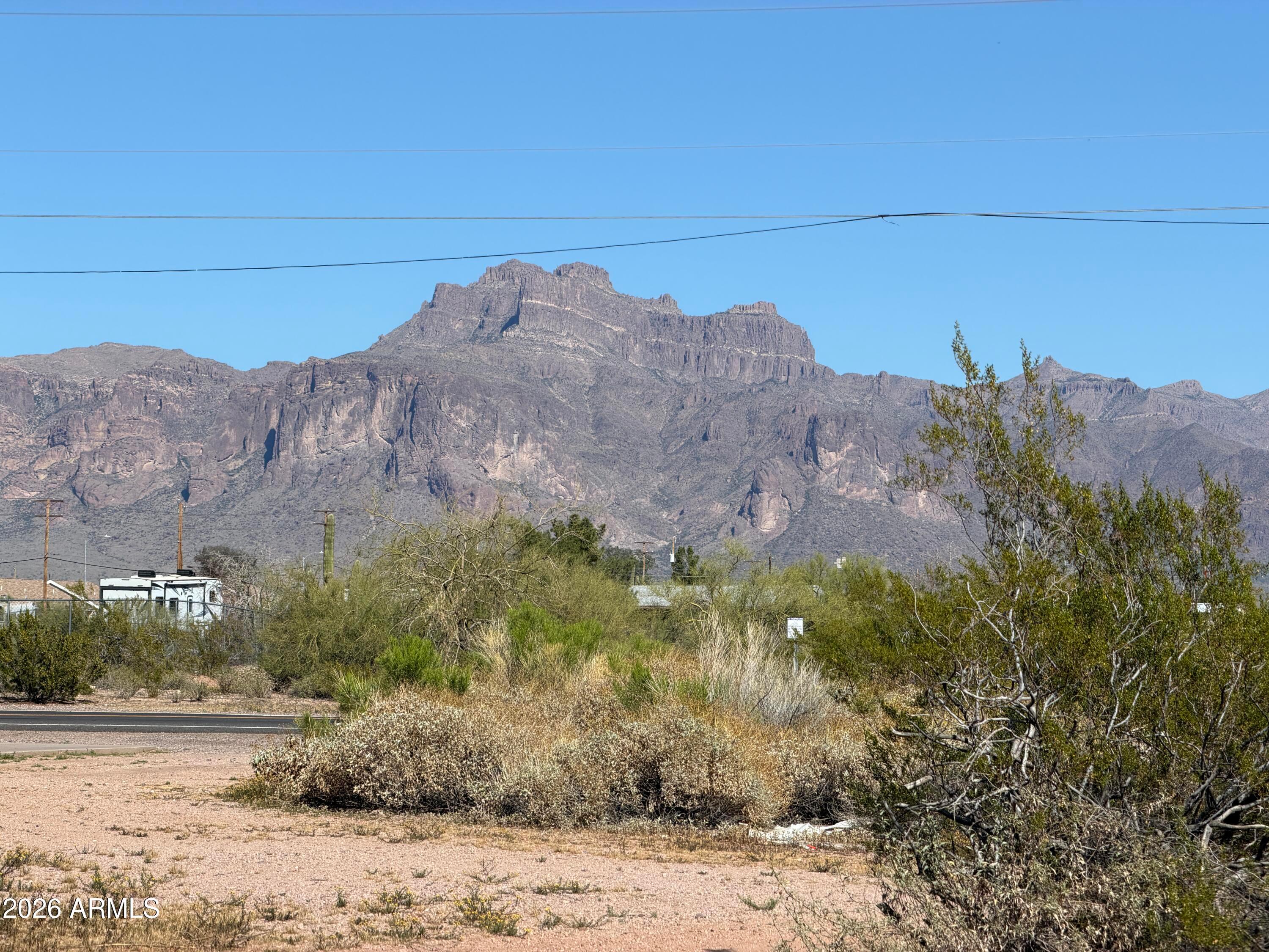 127 South Outpost Road, Unit 4 Apache Junction, AZ 85119 - Photo 2 of 13 a view of a bunch of mountains in the background