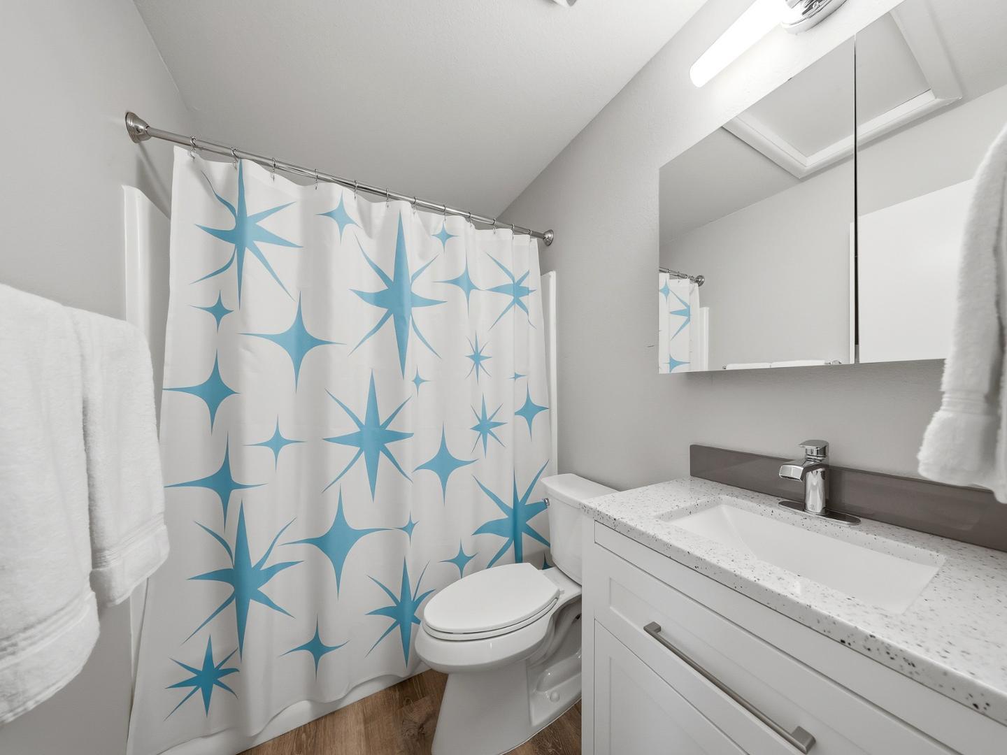 127 South Outpost Road, Unit 4 Apache Junction, AZ 85119 - Photo 9 of 13 a bathroom with a sink toilet and shower