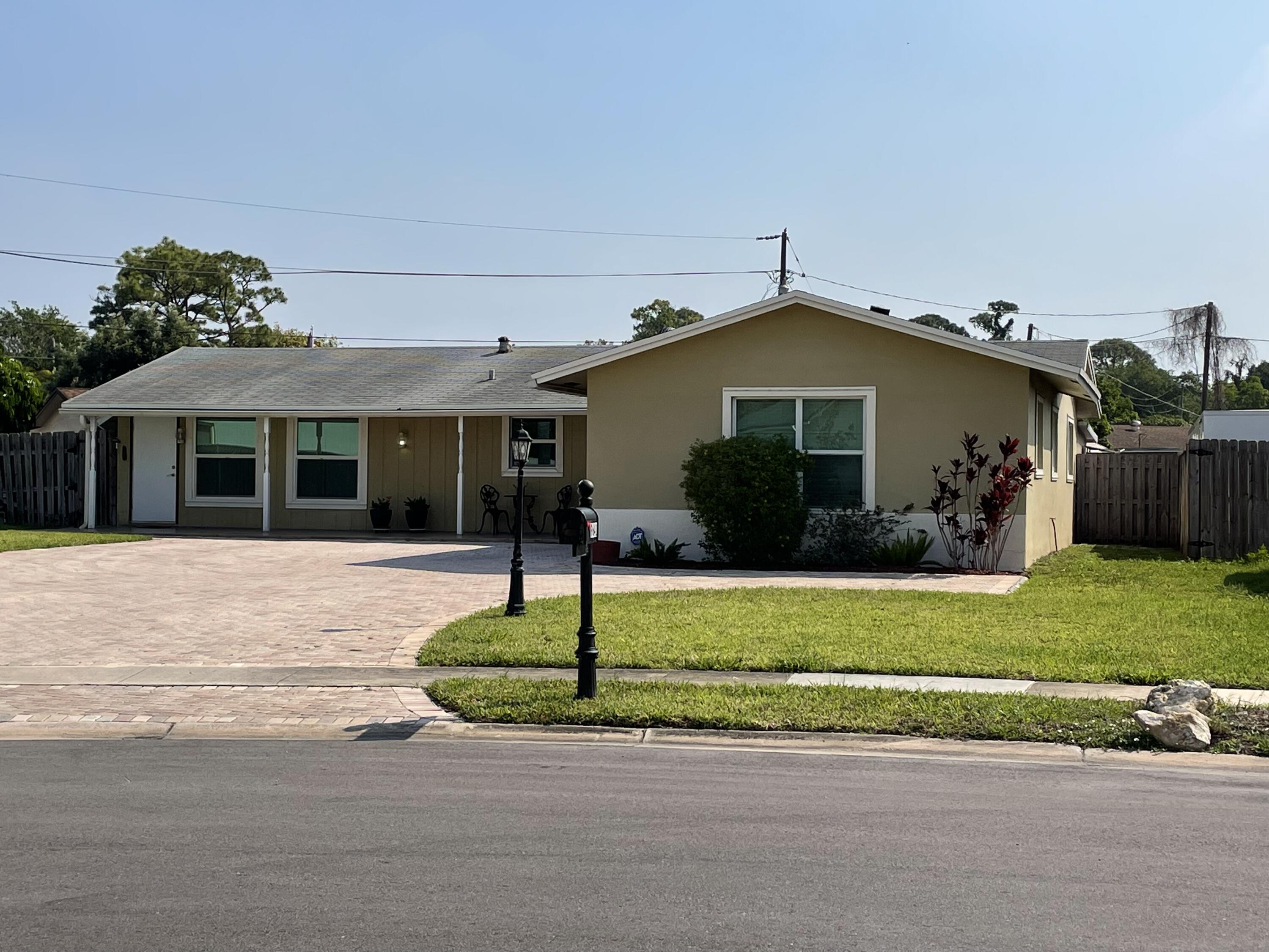 9641 Southwest 2nd Street Boca Raton, FL 33428 - Photo 3 of 23 front 4