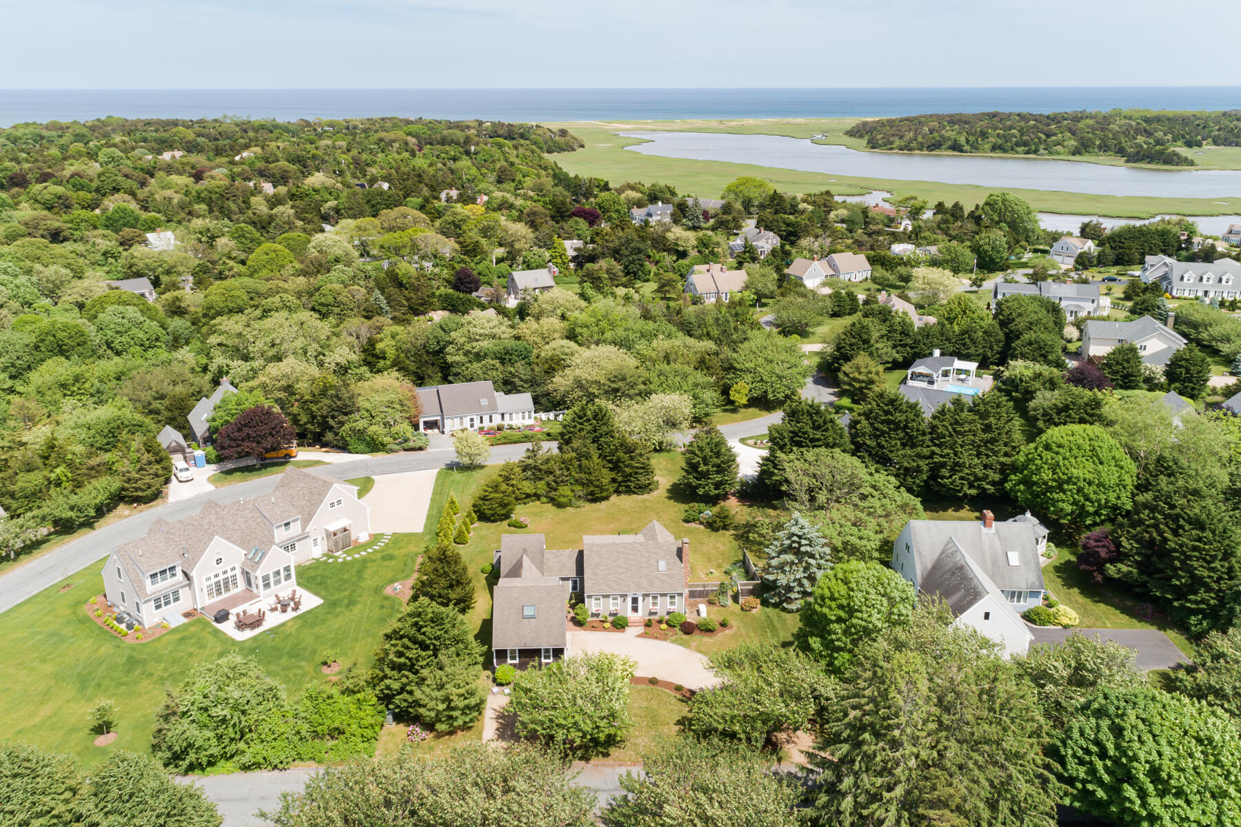 11 Pleasant View Drive Orleans, MA 02653 - Photo 1 of 47 an aerial view of a house with a lake view