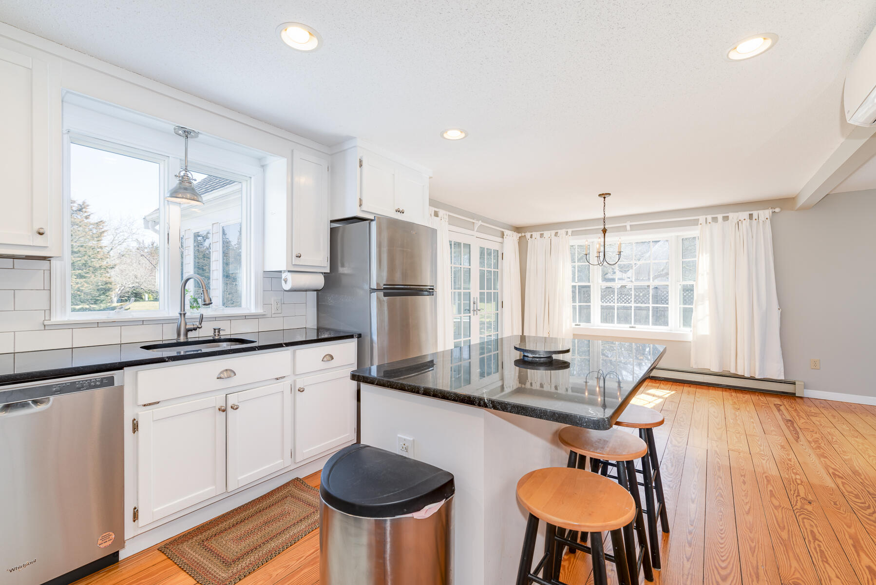 11 Pleasant View Drive Orleans, MA 02653 - Photo 14 of 47 a kitchen with granite countertop white cabinets and refrigerator