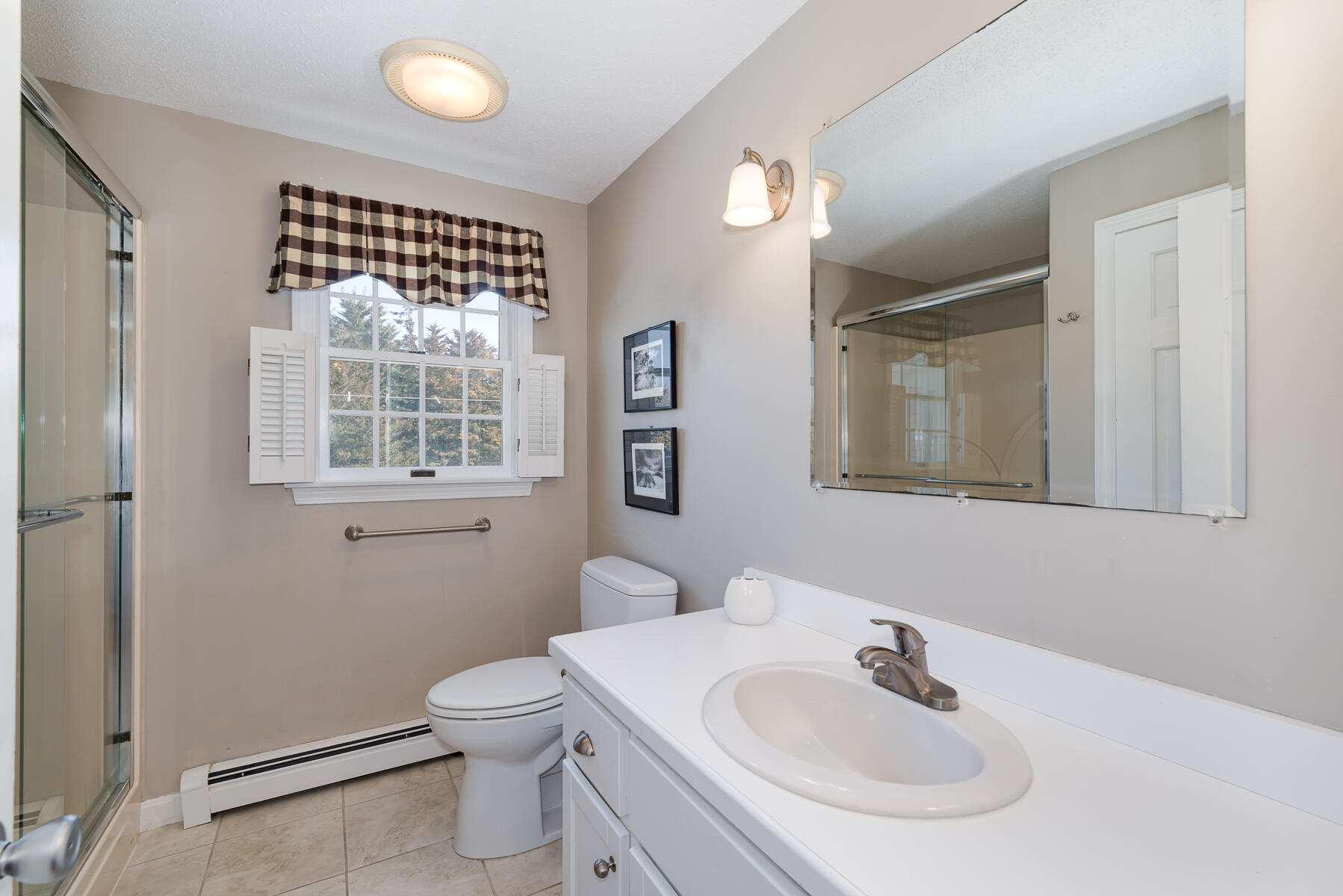 11 Pleasant View Drive Orleans, MA 02653 - Photo 17 of 47 a bathroom with a sink a toilet and mirror