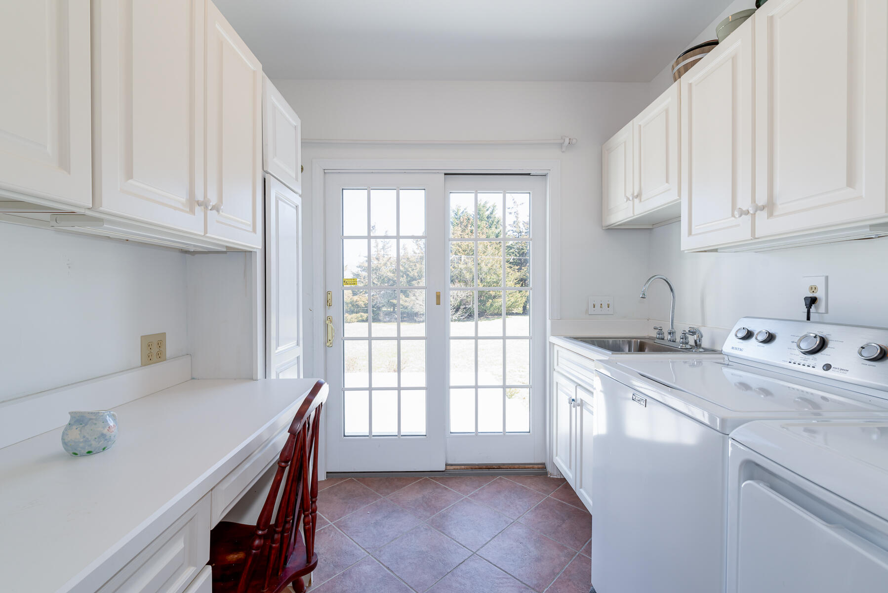 11 Pleasant View Drive Orleans, MA 02653 - Photo 18 of 47 a kitchen with a sink cabinets appliances and a window