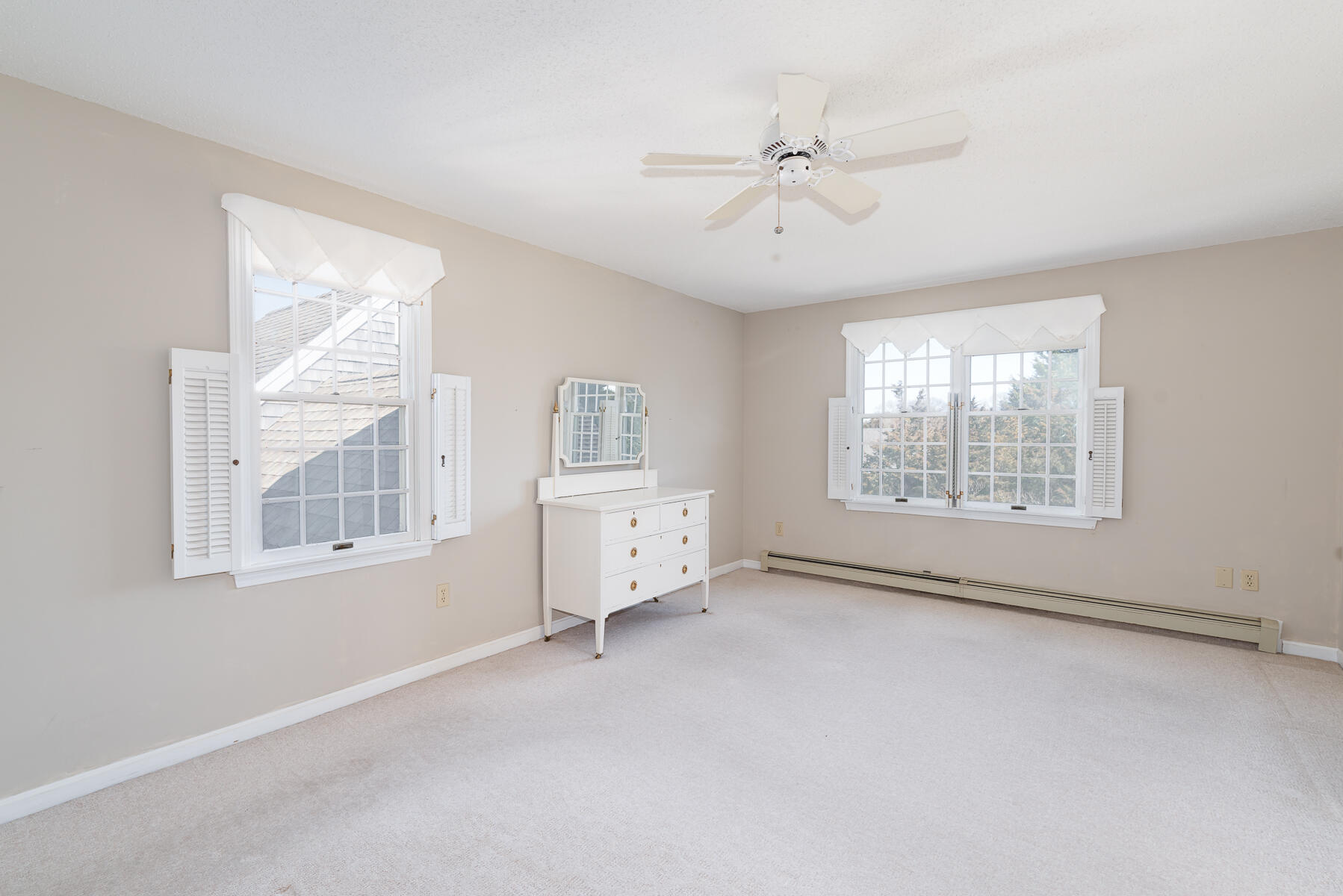 11 Pleasant View Drive Orleans, MA 02653 - Photo 29 of 47 an empty room with windows and fan