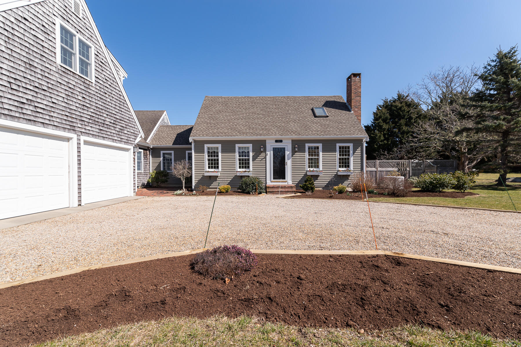 11 Pleasant View Drive Orleans, MA 02653 - Photo 3 of 47 a front view of a house with a yard