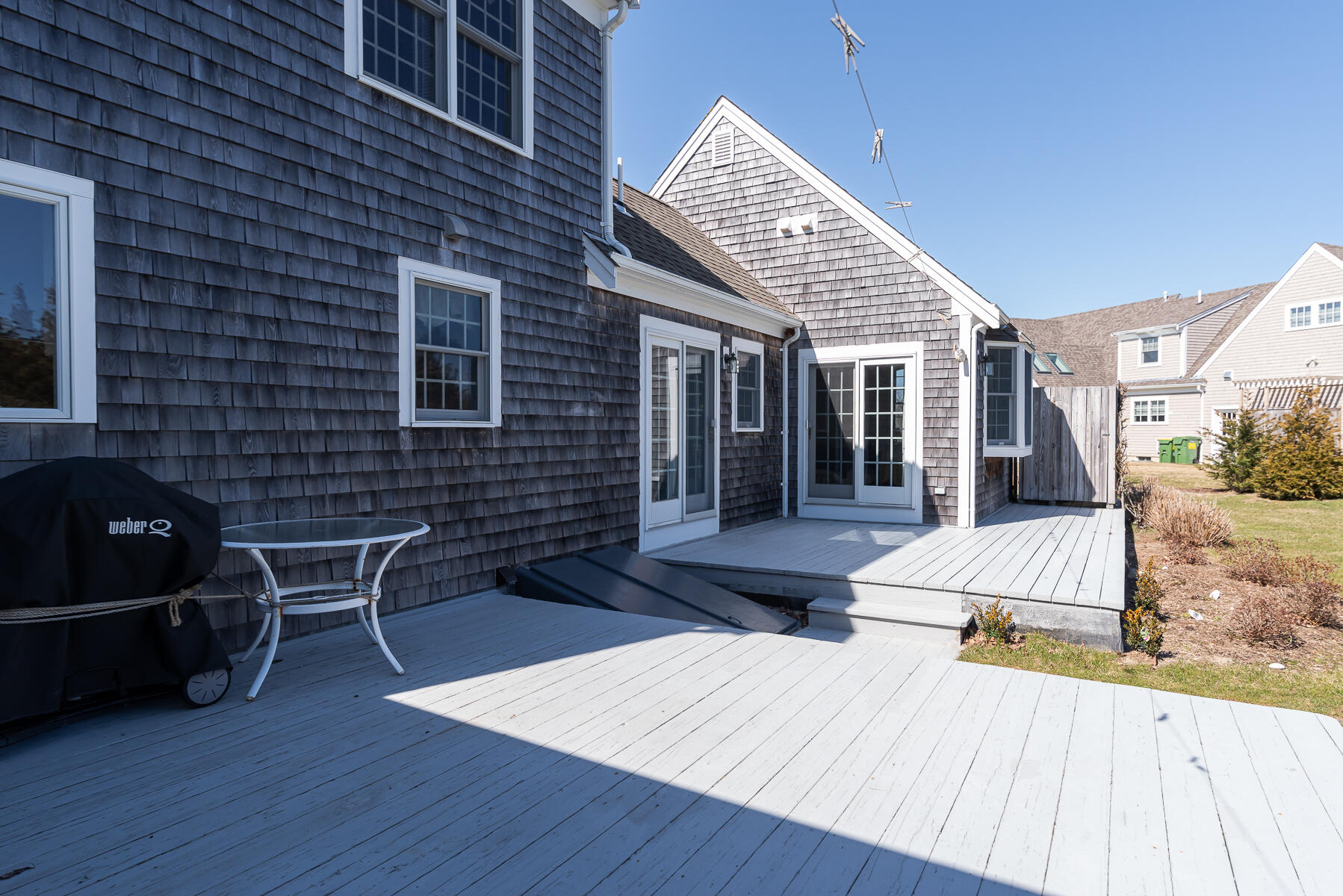 11 Pleasant View Drive Orleans, MA 02653 - Photo 37 of 47 a view of a patio with a table and chairs