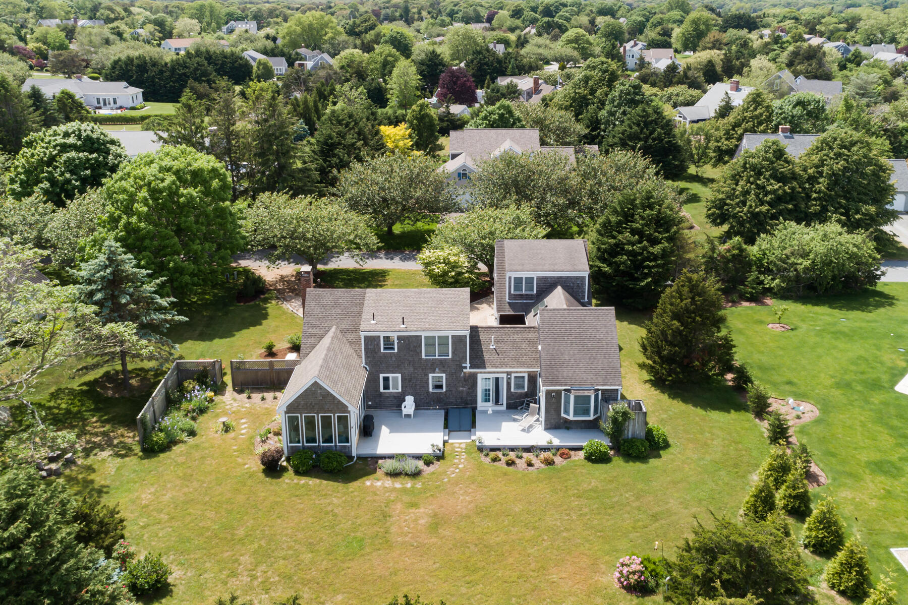 11 Pleasant View Drive Orleans, MA 02653 - Photo 44 of 47 an aerial view of a house with swimming pool and large trees