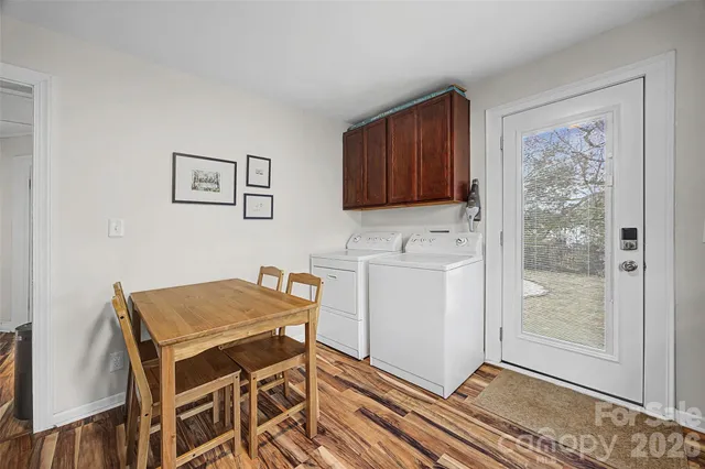 a workspace with wooden floor and a workspace
