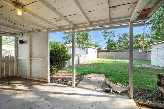 a view of a porch with a backyard