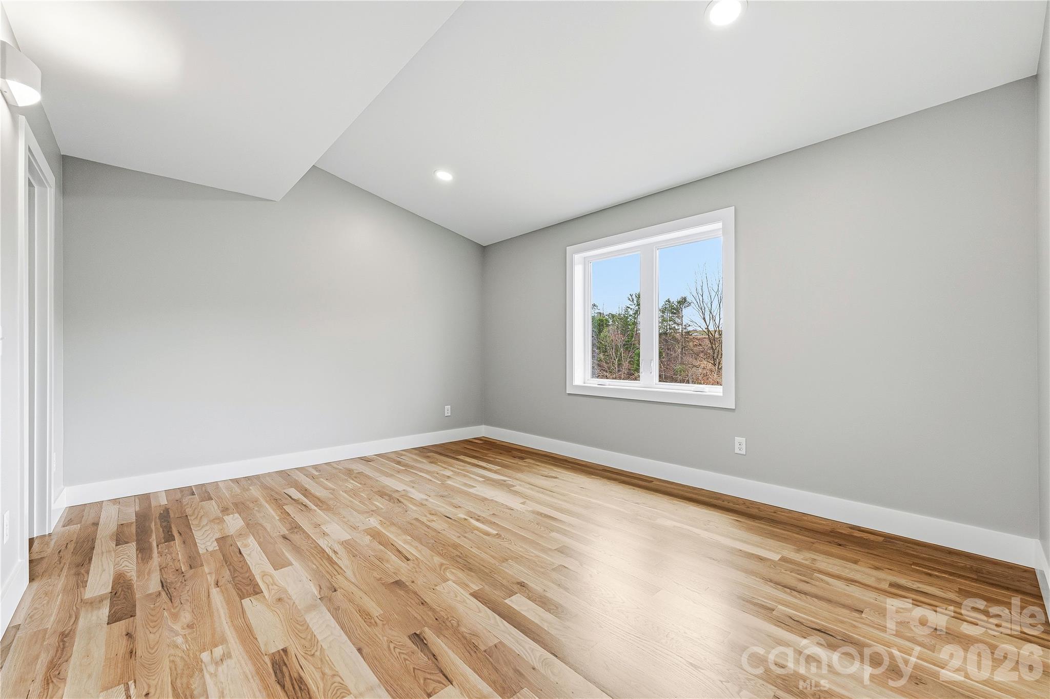 326 Emma Road Asheville, NC 28806 - Photo 12 of 15 a view of an empty room with a window