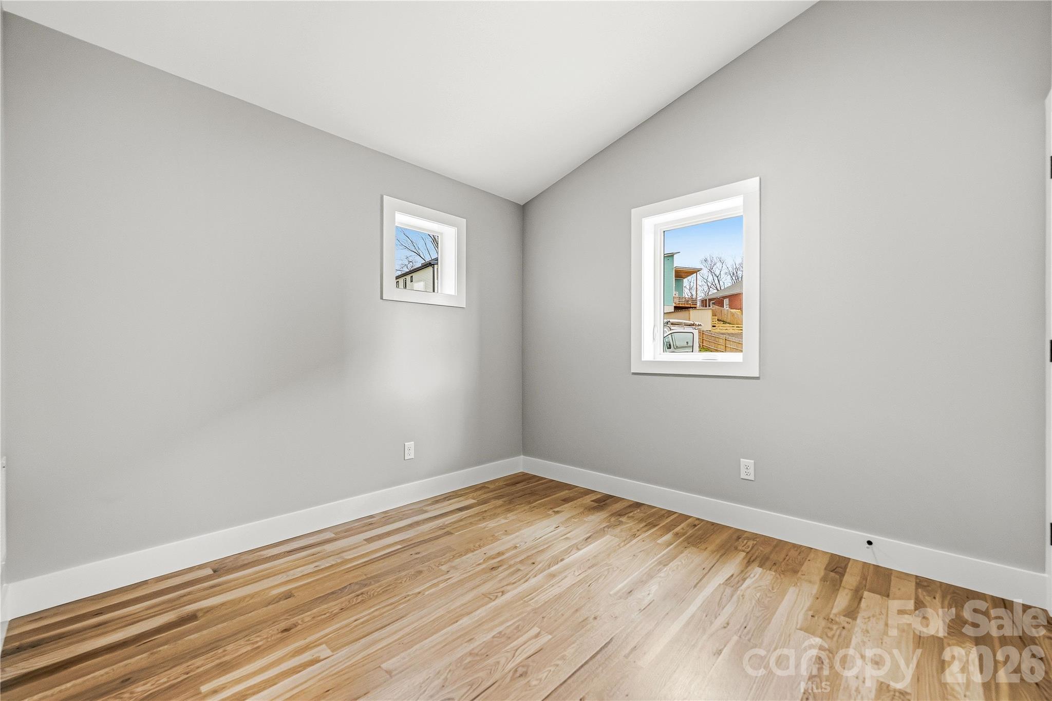 326 Emma Road Asheville, NC 28806 - Photo 13 of 15 a view of empty room with wooden floor