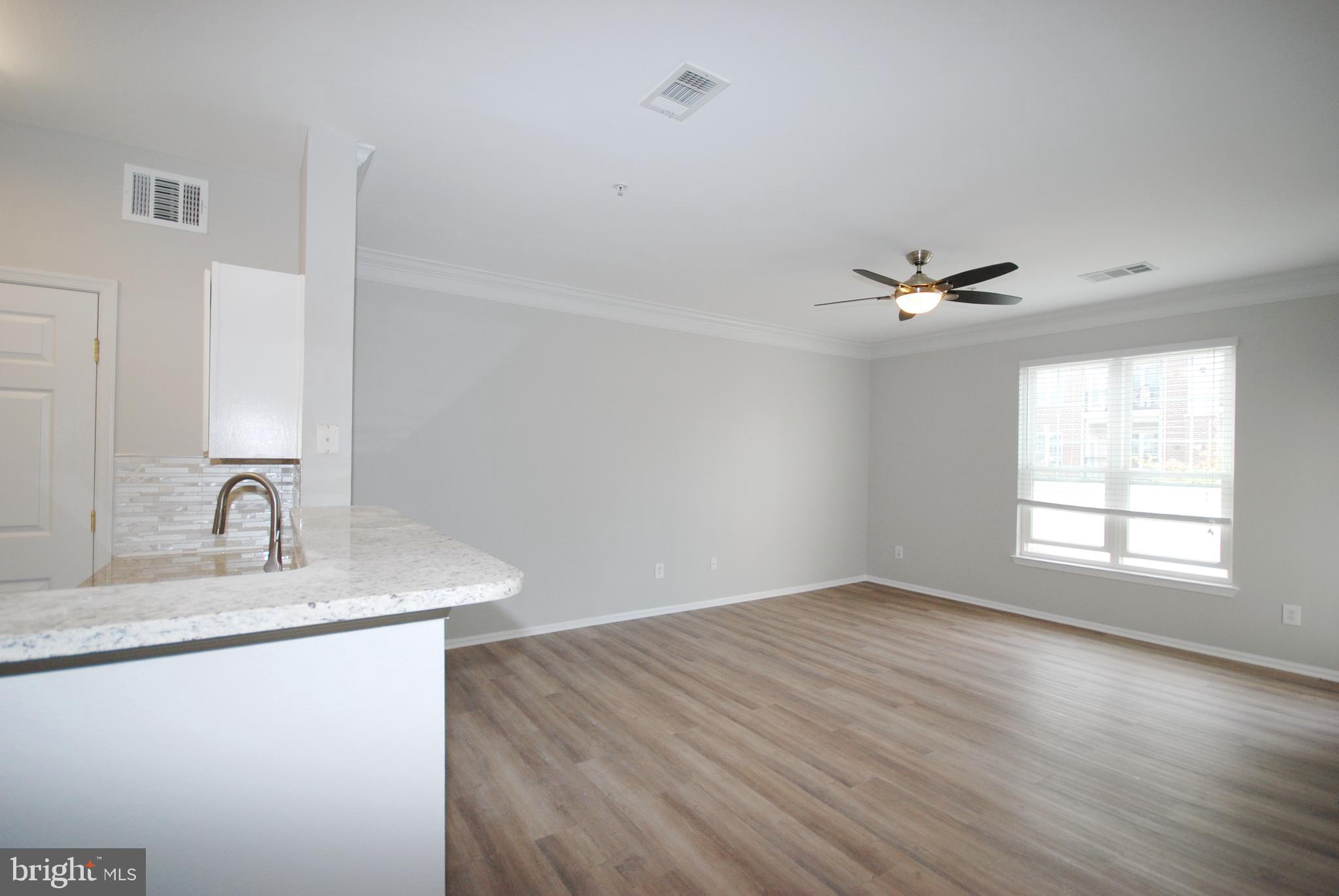 1571 Spring Gate Dr., Unit 6209 McLean, VA 22102 - Photo 10 of 31 a bathroom with a sink vanity and a mirror