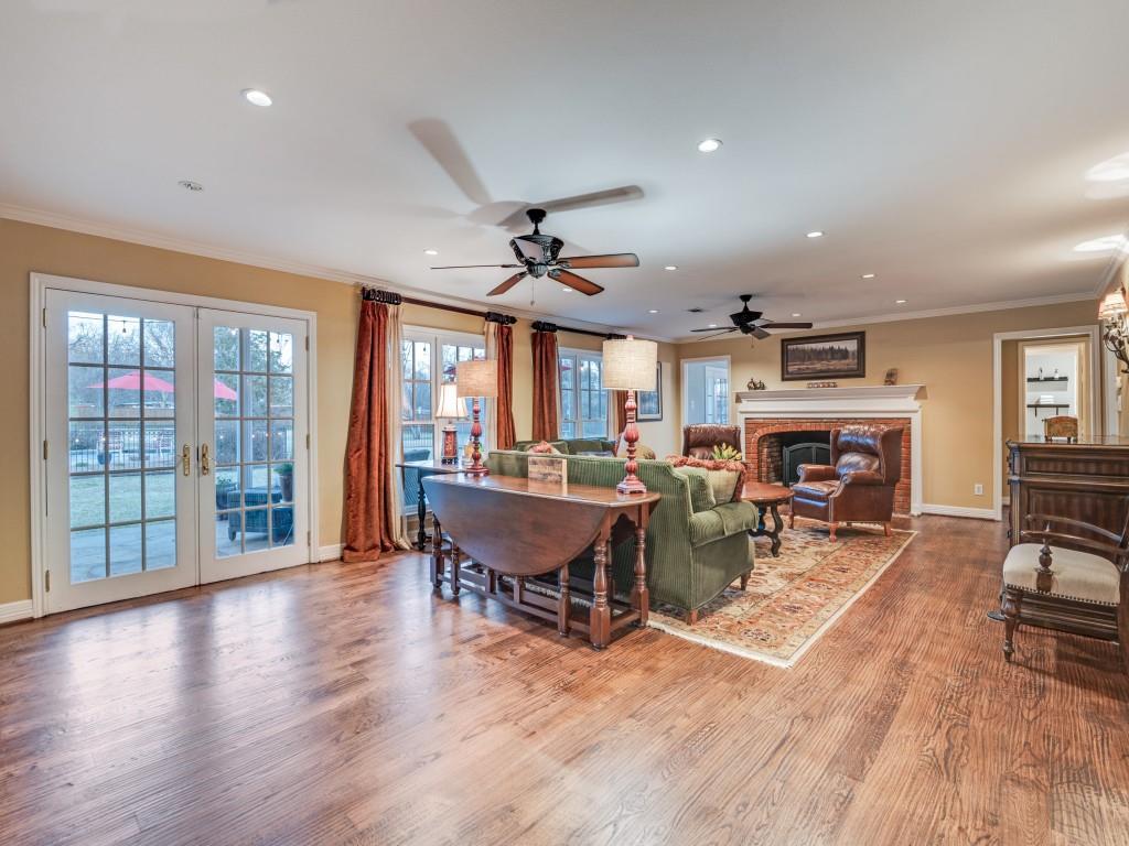 343 East Tripp Road Sunnyvale, TX 75182 - Photo 10 of 36 a view of a livingroom with furniture window and wooden floor