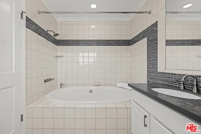 a bathroom with a sink and a bathtub
