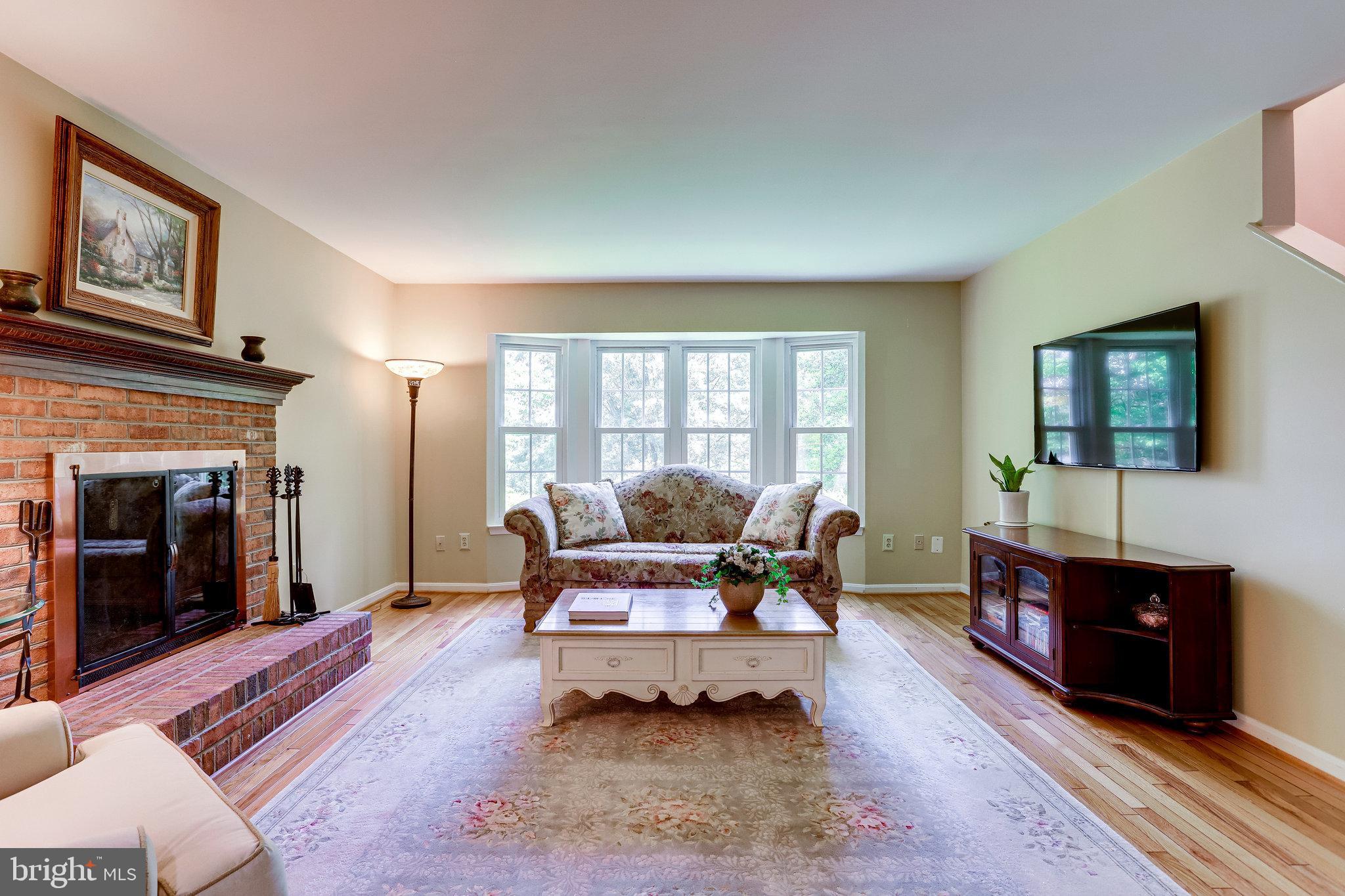 1216 Bishopsgate Way Reston, VA 20194 - Photo 13 of 48 Cozy Family Room with WB Fireplace