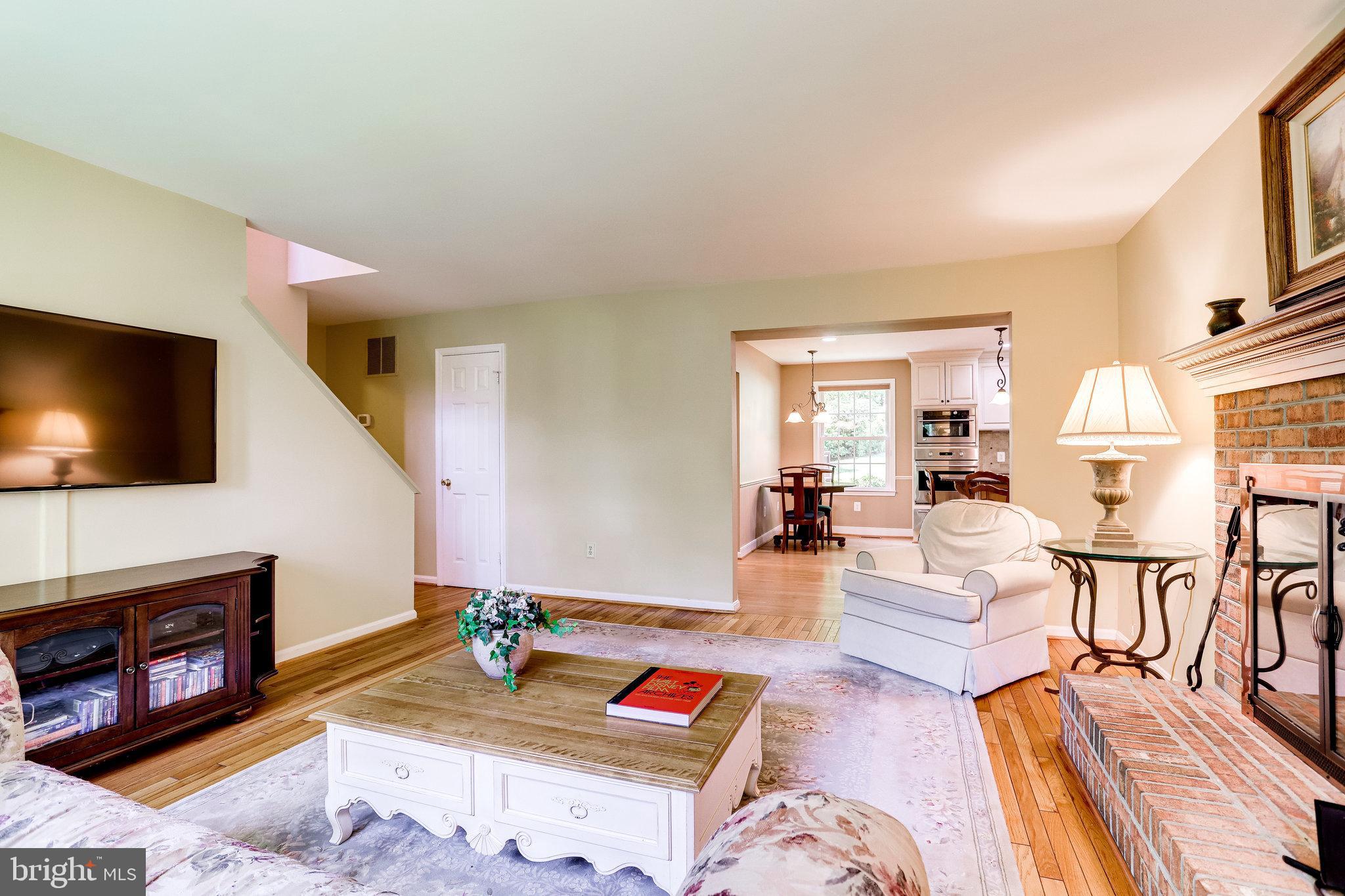 1216 Bishopsgate Way Reston, VA 20194 - Photo 14 of 48 Cozy Family Room with WB Fireplace