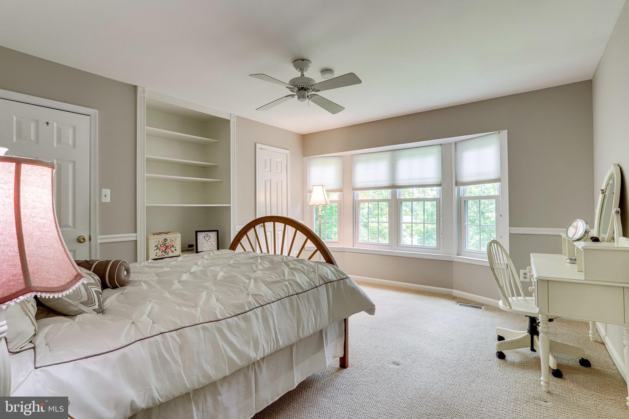 1216 Bishopsgate Way Reston, VA 20194 - Photo 21 of 48 Bedroom #2 with two closets & Built-in Bookshelves
