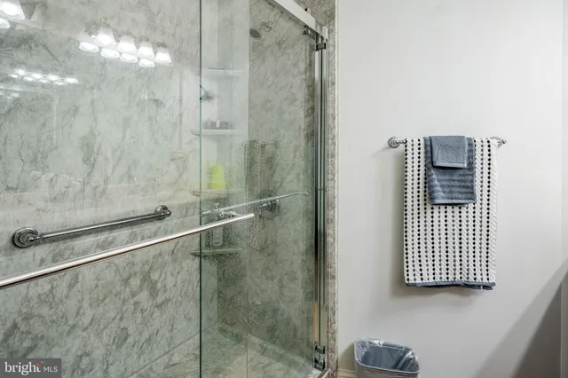 a bathroom with a sink a vanity and a mirror