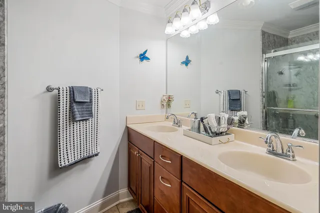 a bedroom with a bed and lamp