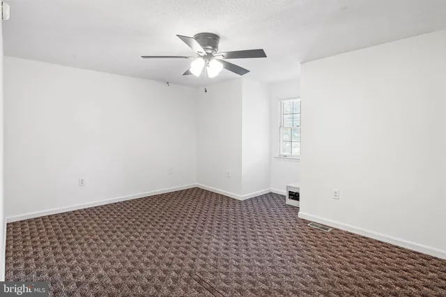 a view of a livingroom with entryway