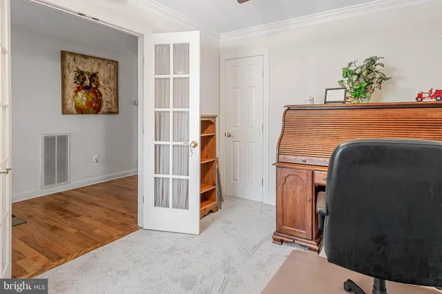 a view of livingroom with furniture and cabinet