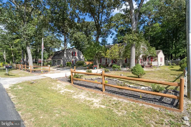 a view of outdoor space with garden and deck