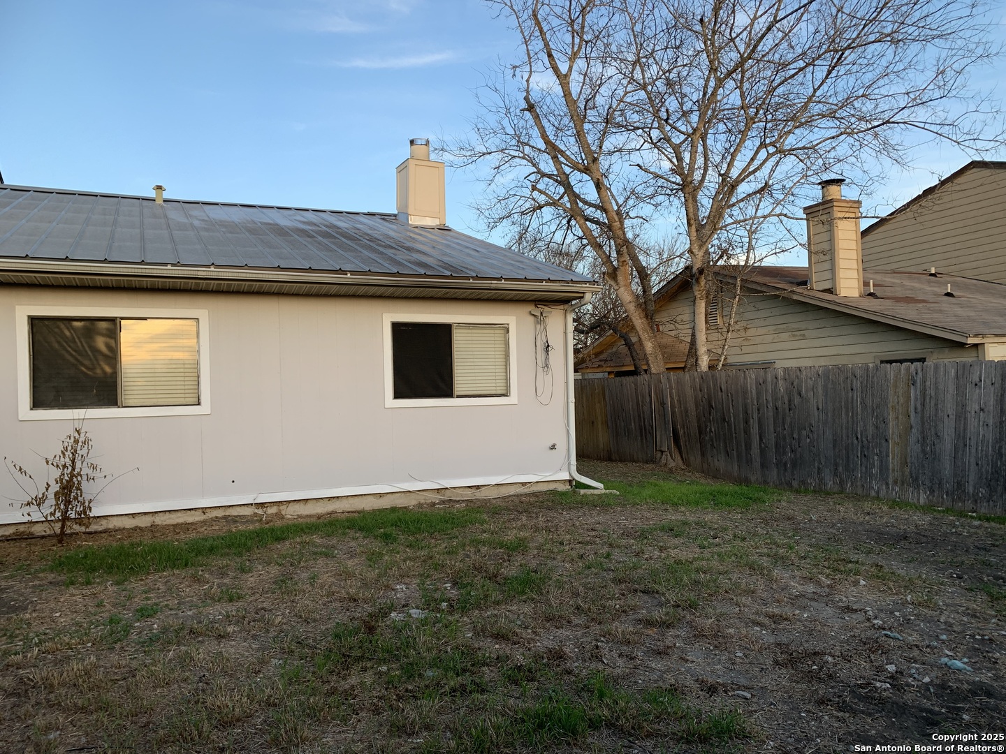 8441 Forest Ridge Drive, Unit 80 San Antonio, TX 78239 - Photo 10 of 10 a backyard of a house