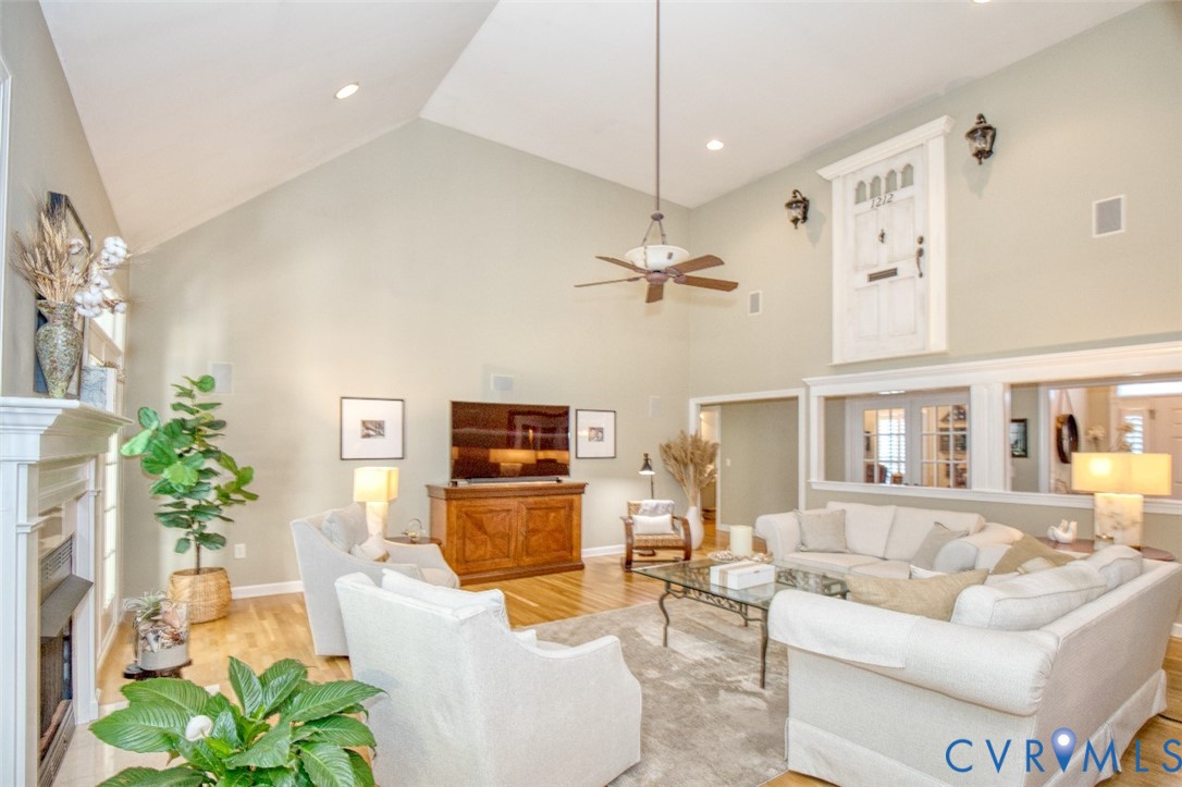 9960 Mill Pond Road Toano, VA 23168 - Photo 21 of 42 Vaulted ceiling, recessed lighting, wood-finish fl