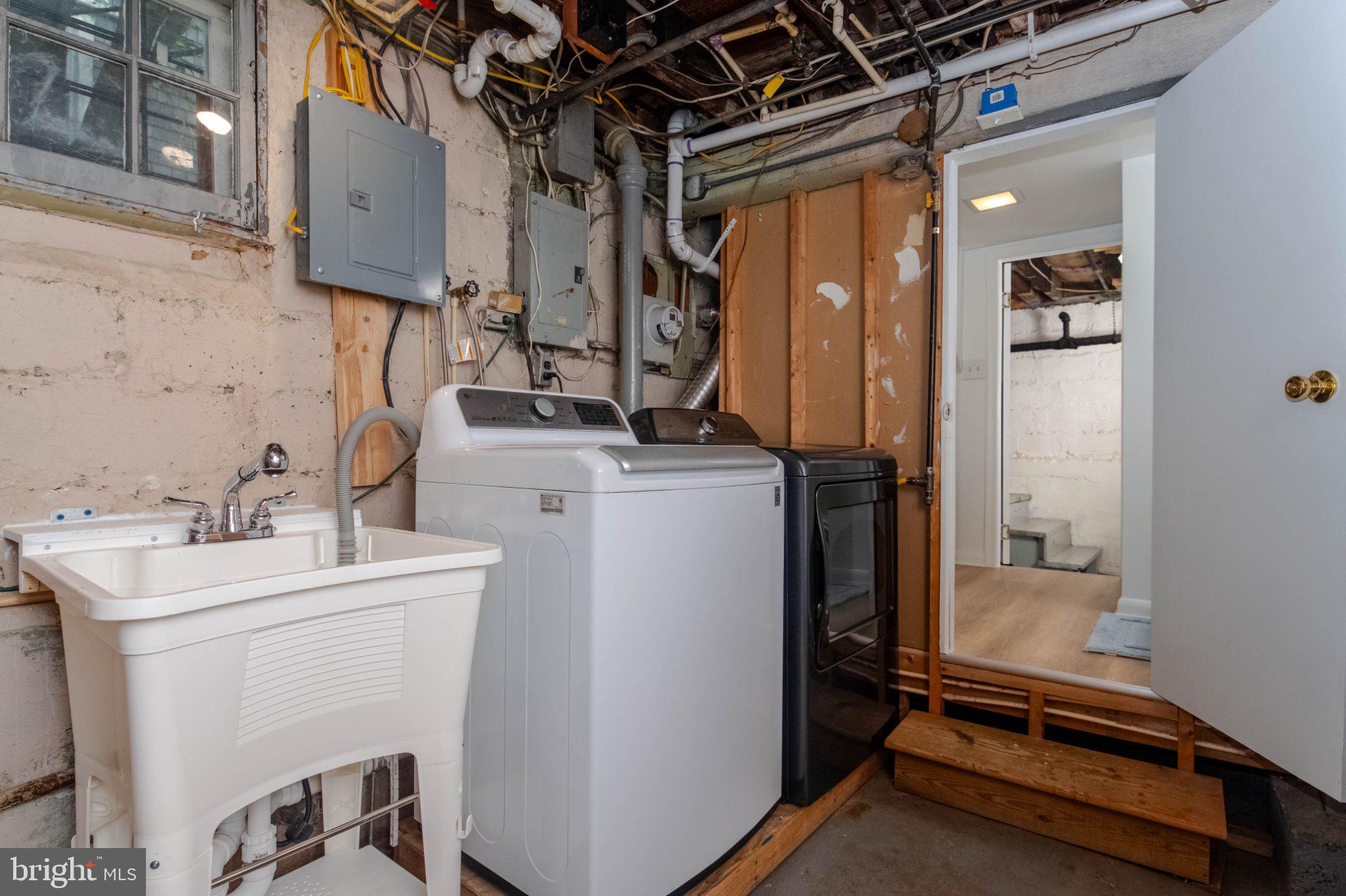 5114 Norwood Road Baltimore, MD 21212 - Photo 38 of 54 Functional laundry space with access.