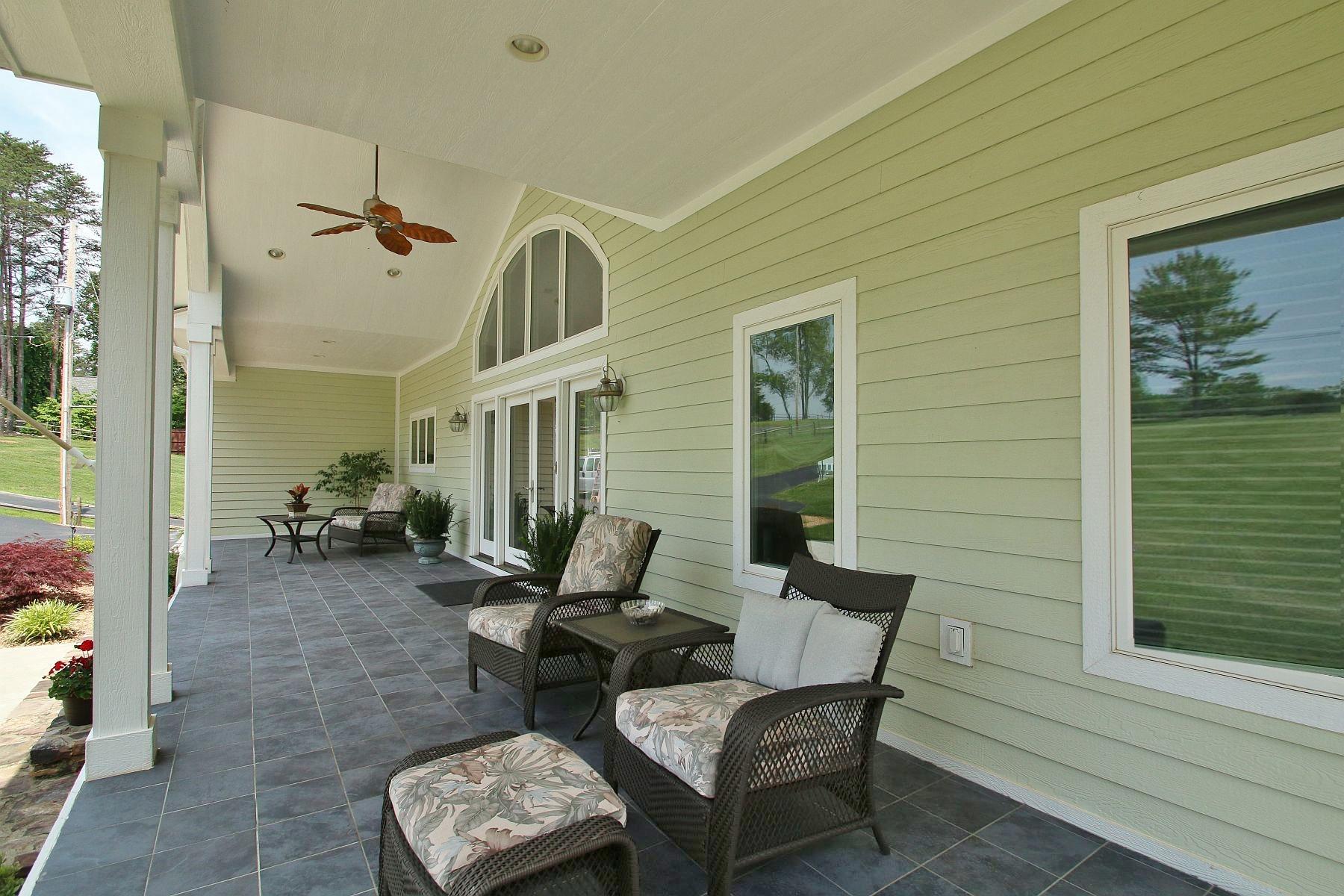 1961 Merriman Way Road Moneta, VA 24121 - Photo 4 of 58 Expansive front covered porch