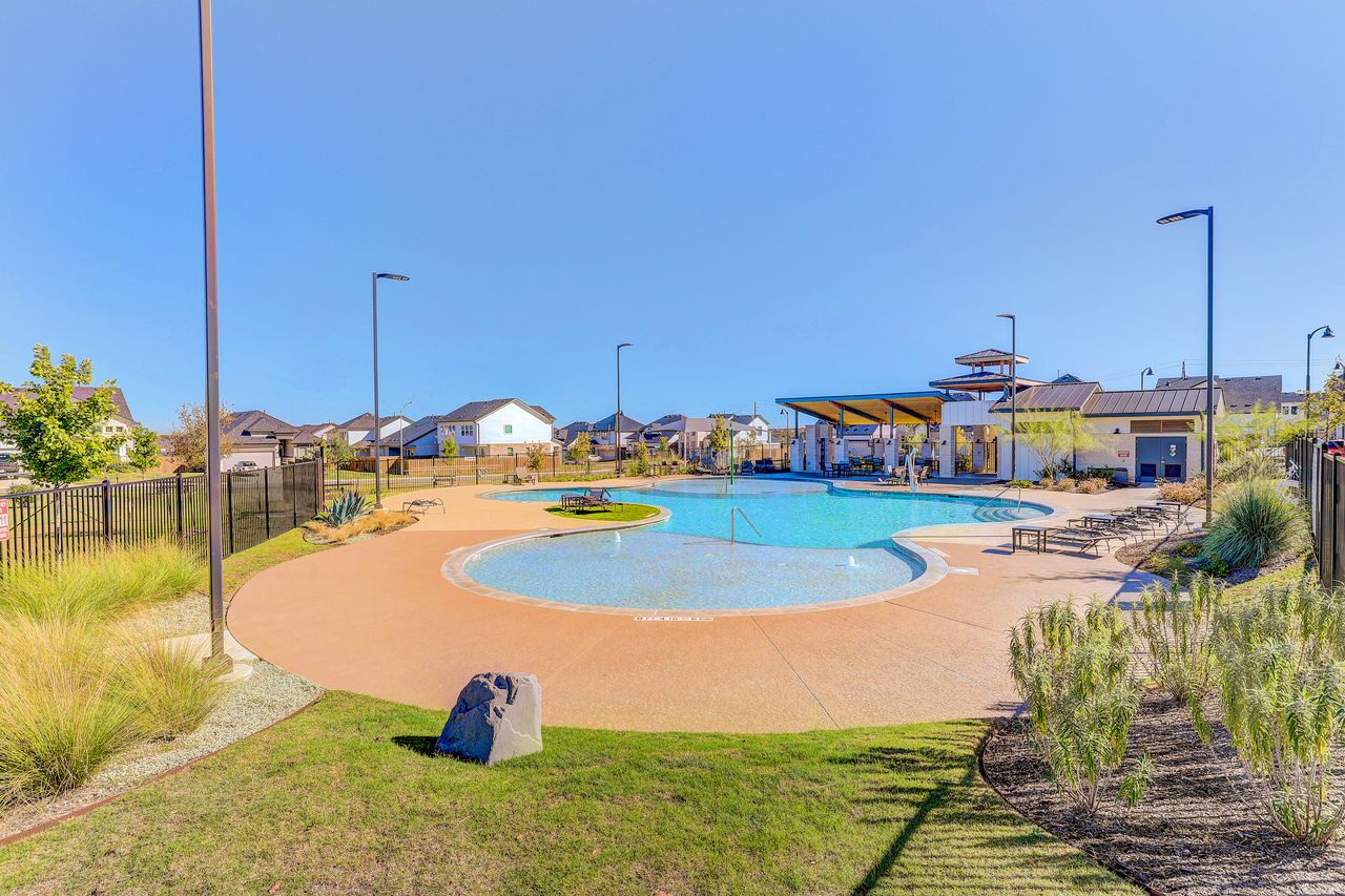 4705 Sea Salt Drive Austin, TX 78747 - Photo 39 of 40 Community pool with a patio area and a residential view