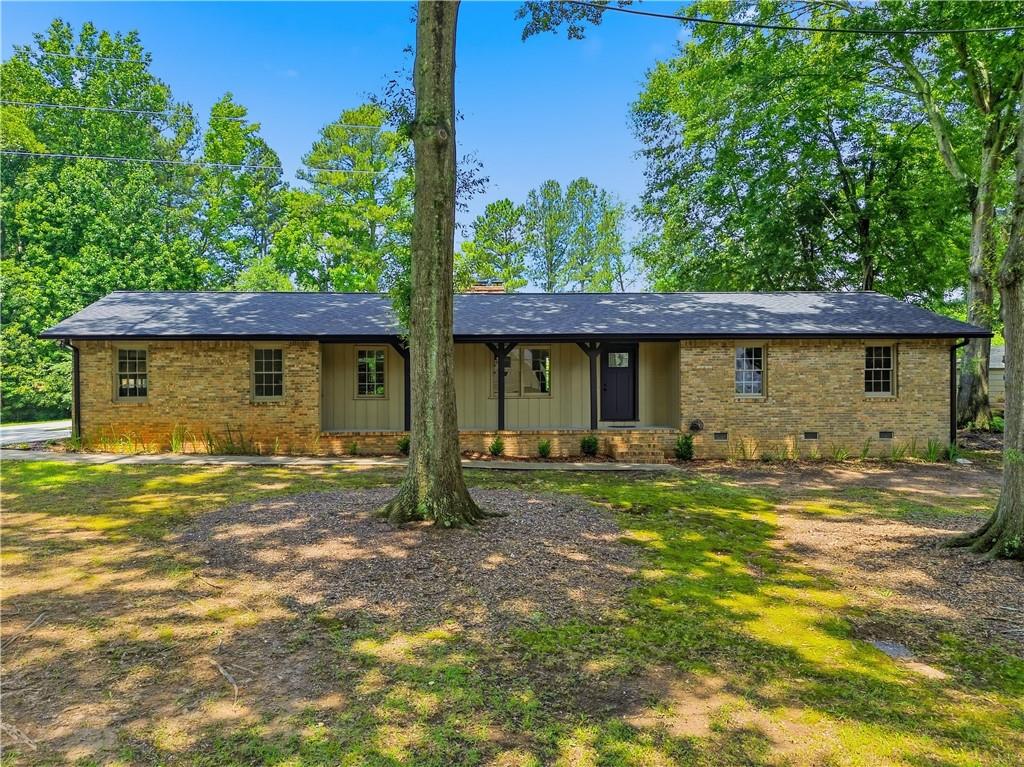 125 Childers Road Canton, GA 30115 - Photo 2 of 48 a view of a house with a yard