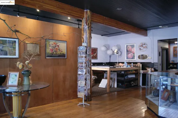 a view of a workspace with furniture