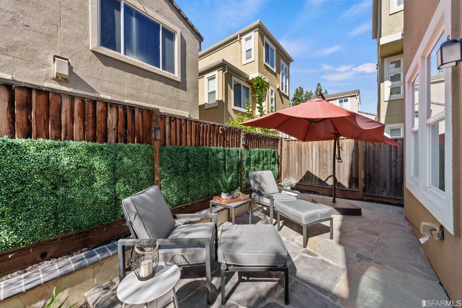 3547 Meyer Place Santa Clara, CA 95051 - Photo 28 of 34 a view of a patio with a table and chairs under an umbrella