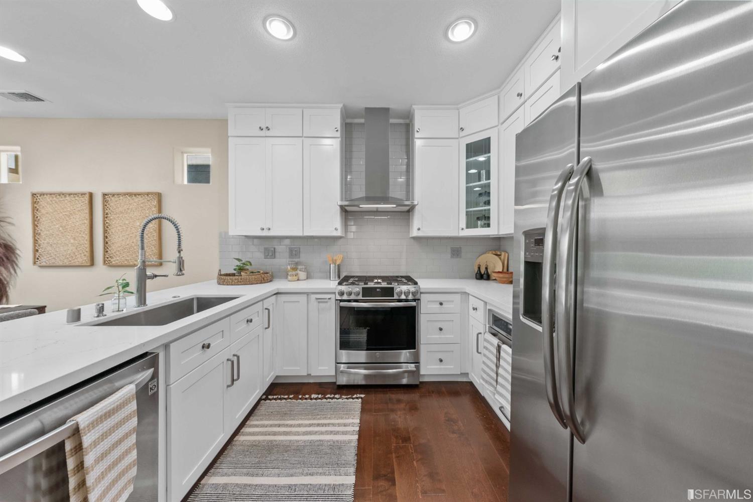 3547 Meyer Place Santa Clara, CA 95051 - Photo 6 of 34 a kitchen with a sink cabinets and stainless steel appliances