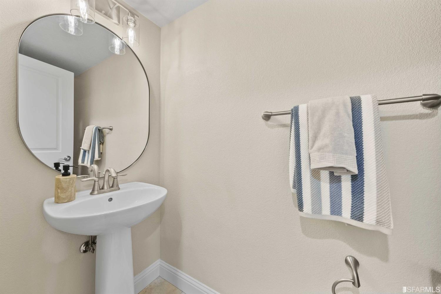 3547 Meyer Place Santa Clara, CA 95051 - Photo 8 of 34 a bathroom with a sink and mirror