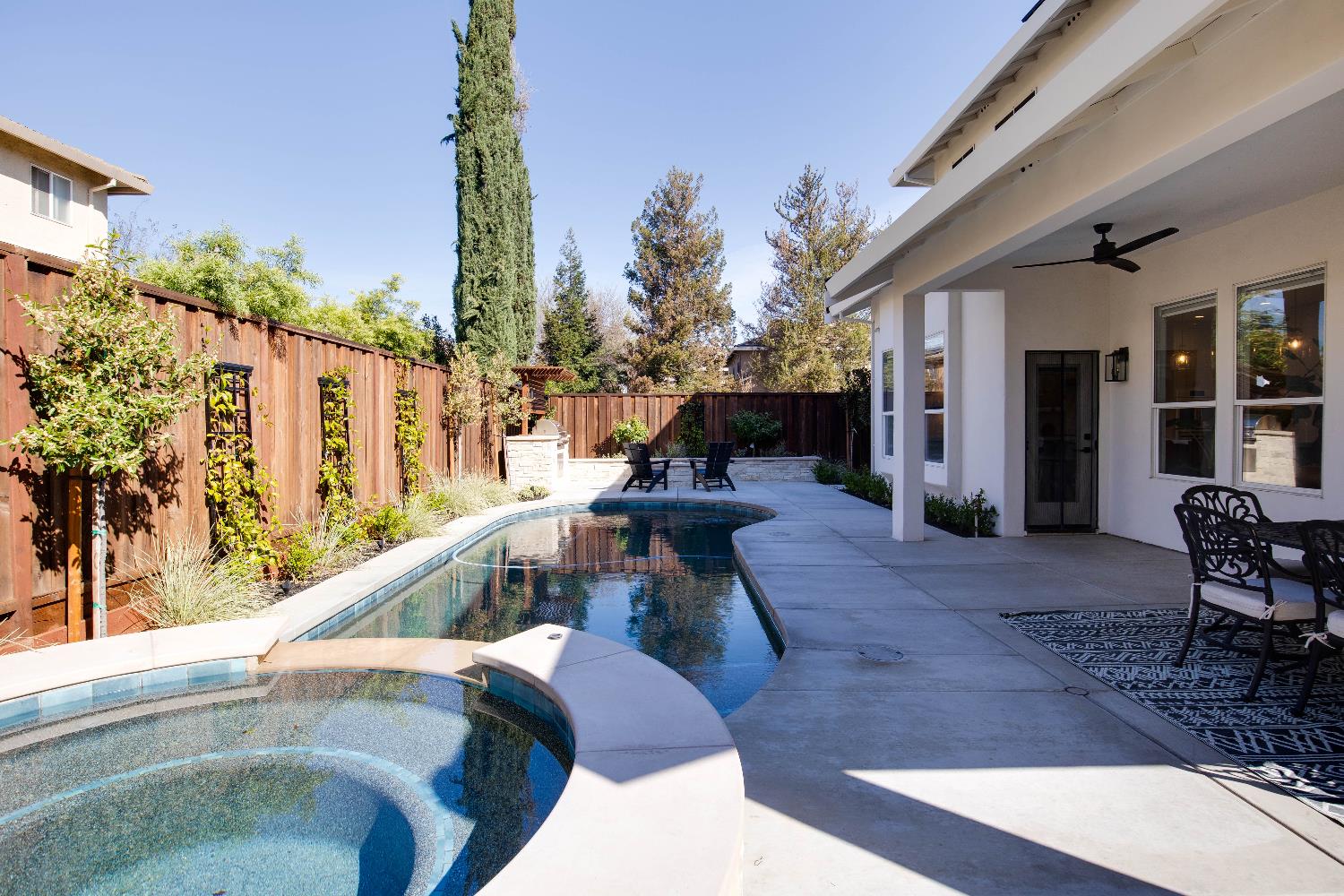 637 Rebekah Court Ripon, CA 95366 - Photo 6 of 69 a view of a patio with couches table and chairs with potted plants