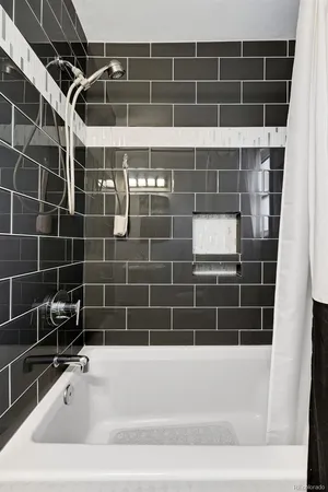 a view of a bathtub in a bathroom