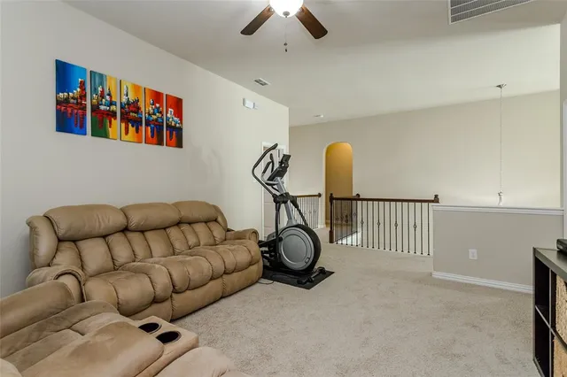 a bedroom with two beds and a window