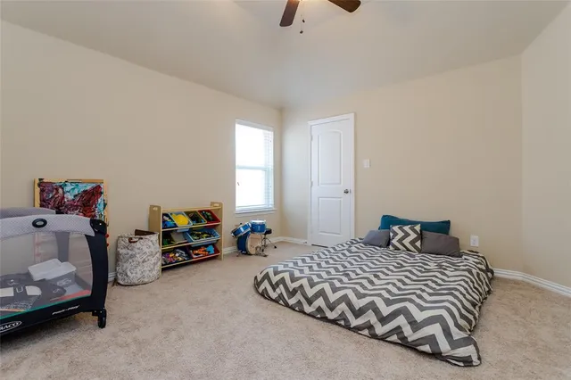 a view of a livingroom with furniture and windows