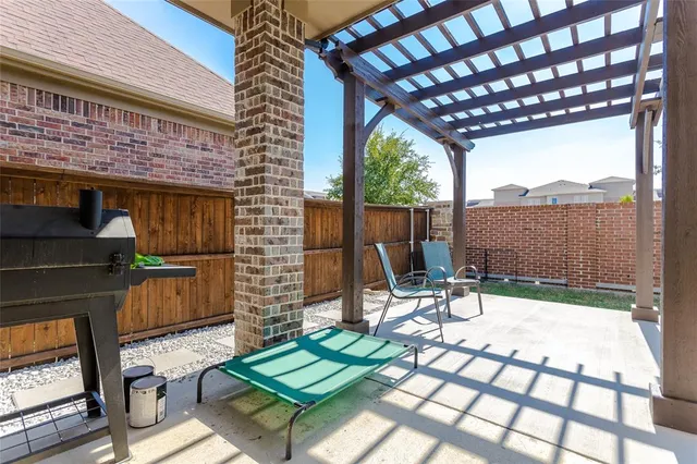 a view of a house with swimming pool and porch