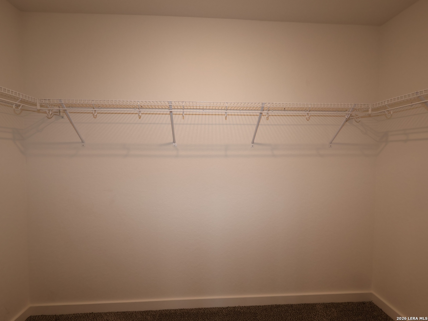 8626 Rucker Pond Trail San Antonio, TX 78252 - Photo 12 of 24 a view of small space with racks on the wall