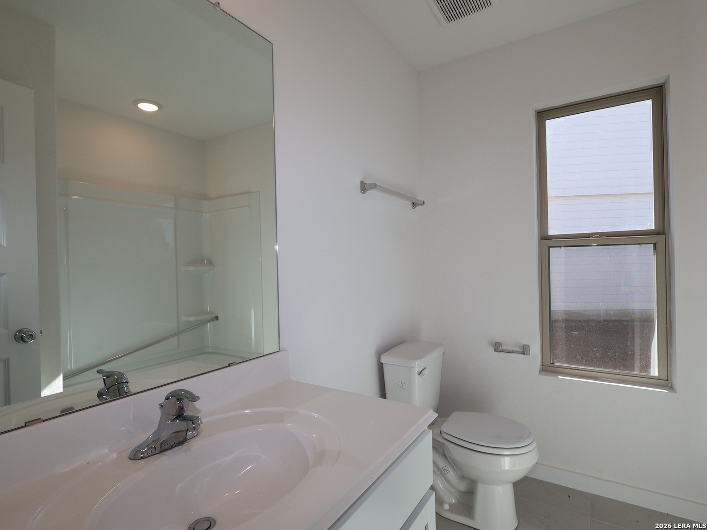 8626 Rucker Pond Trail San Antonio, TX 78252 - Photo 15 of 24 a bathroom with a sink and a toilet