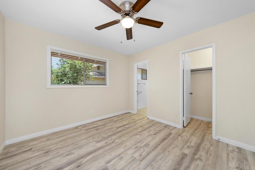2073 Valley Rim Road El Cajon, CA 92019 - Photo 12 of 20 a view of empty room with wooden floor and fan