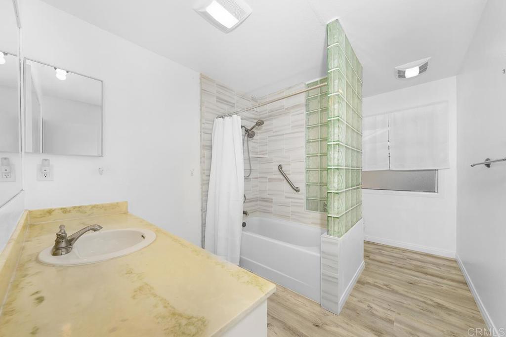 2073 Valley Rim Road El Cajon, CA 92019 - Photo 16 of 20 a bathroom with a sink and a shower