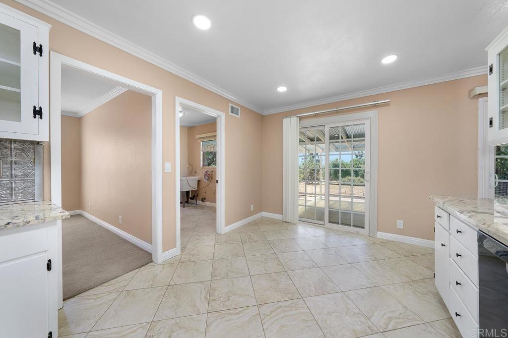 2073 Valley Rim Road El Cajon, CA 92019 - Photo 5 of 20 a view of an empty room with a window