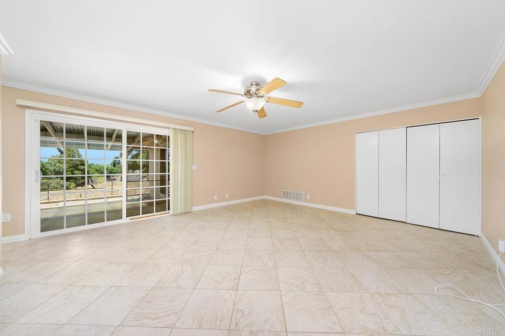 2073 Valley Rim Road El Cajon, CA 92019 - Photo 6 of 20 a view of an empty room with a window